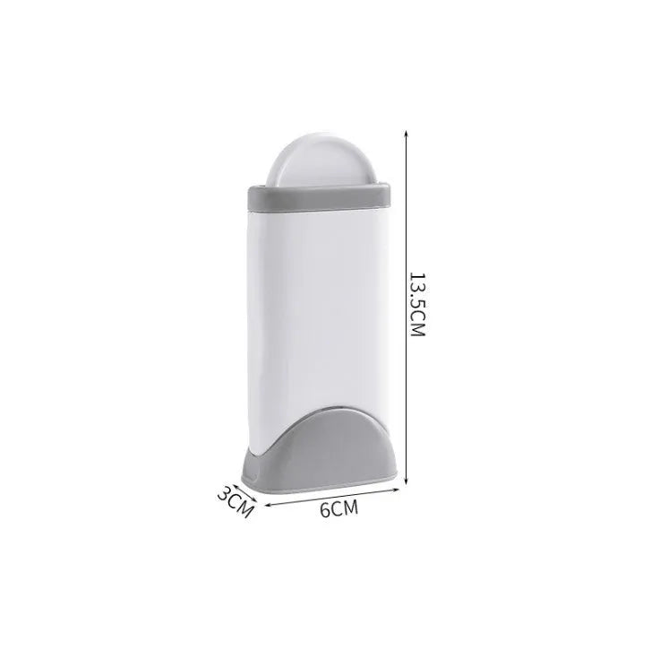 Electrostatic hair removal brush with polyester yarn bristles, two sizes and colour options, on a fabric surface