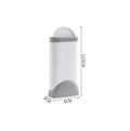 Electrostatic hair removal brush with polyester yarn bristles, two sizes and colour options, on a fabric surface
