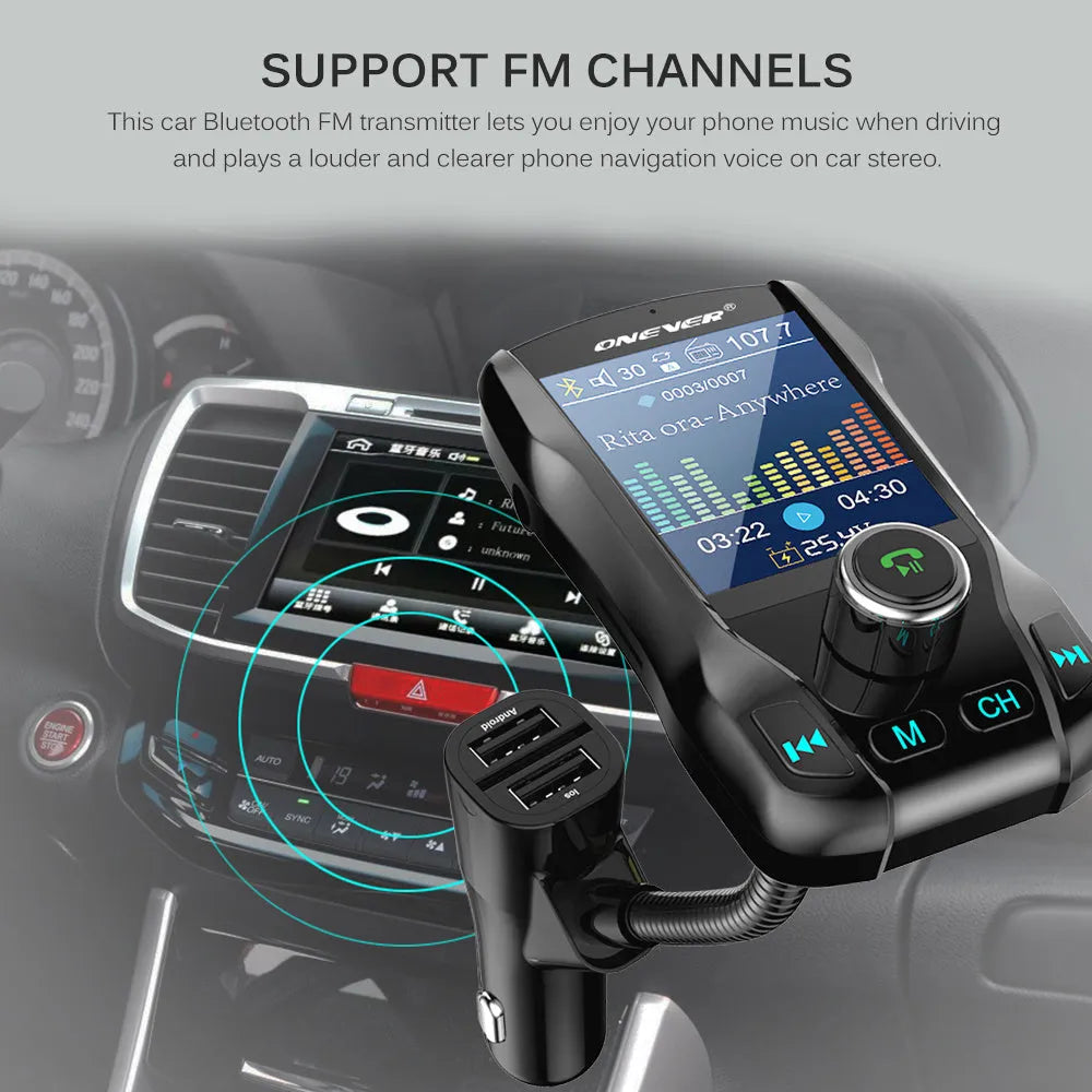 Black car Bluetooth FM transmitter with colour screen and dual USB ports plugged into a car dashboard.
