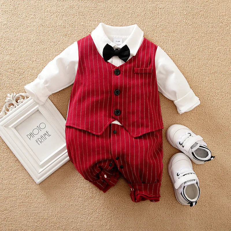 Wine red cotton baby boy romper suit with long sleeves and trouser legs.
