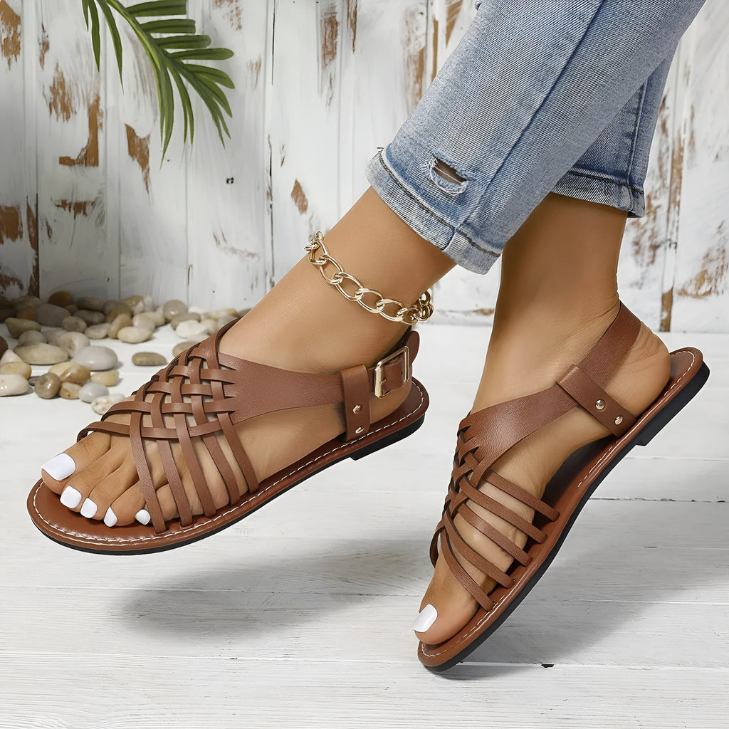 Flat buckle open toe Roman beach slippers with cross strap in black or dark brown
