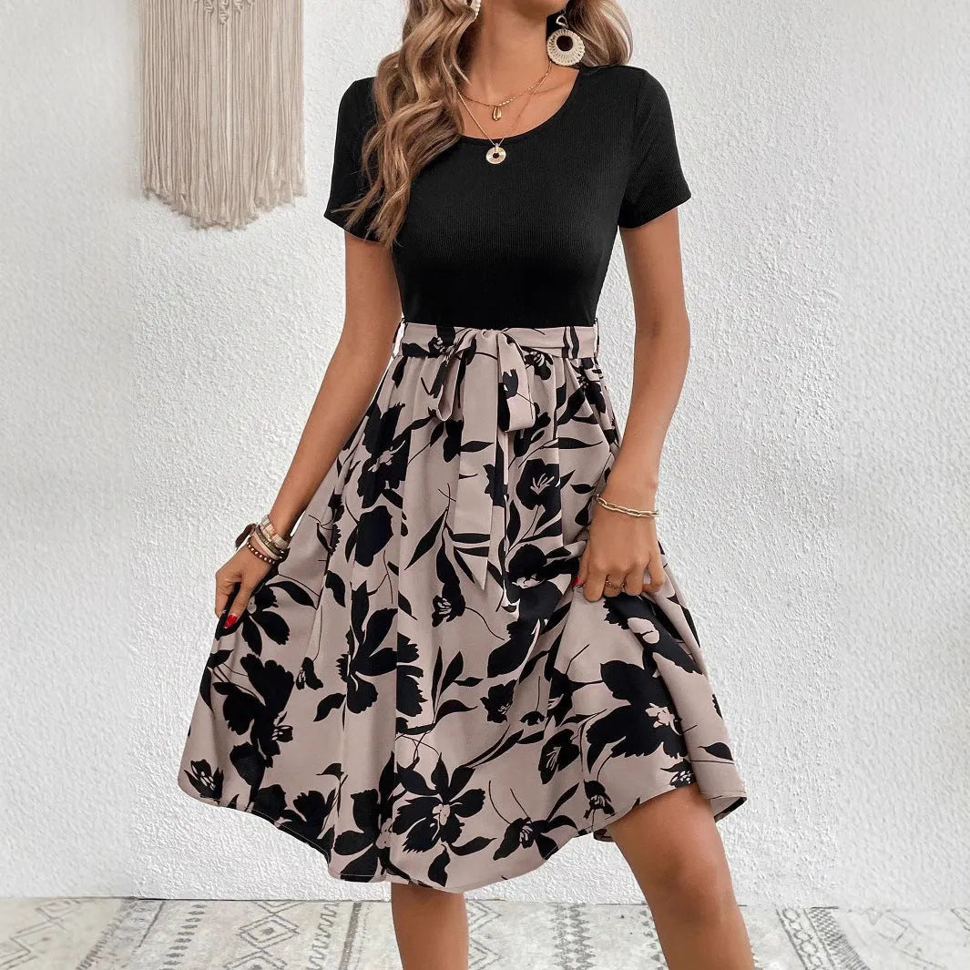 Khaki women's A-line dress with floral printing and lace-up detail on the front.