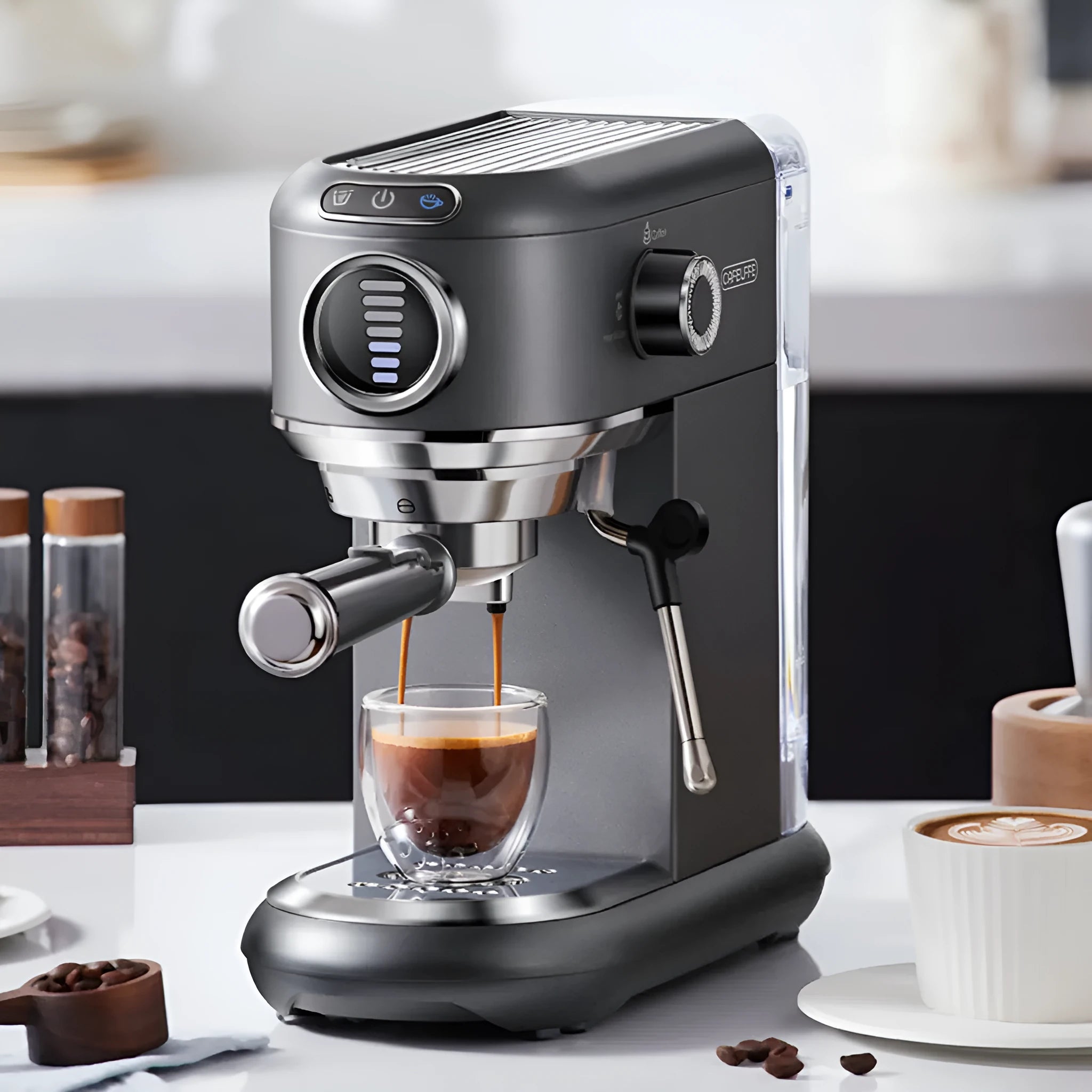 Dark gray espresso coffee machine with steam wand and control panel on countertop