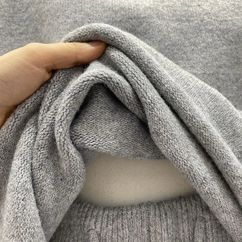 Women’s loose-fitting knitted set with long sleeve sweater and shorts in dark gray