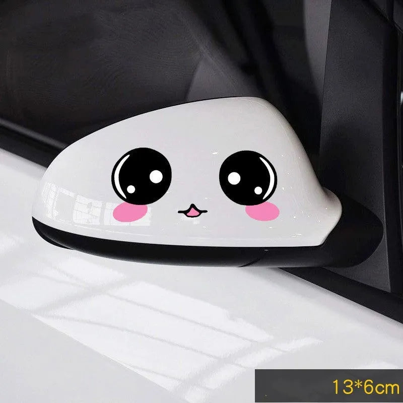 A pair of reflective cartoon eye car stickers made from PET vinyl, designed for vehicle body or rearview mirror.
