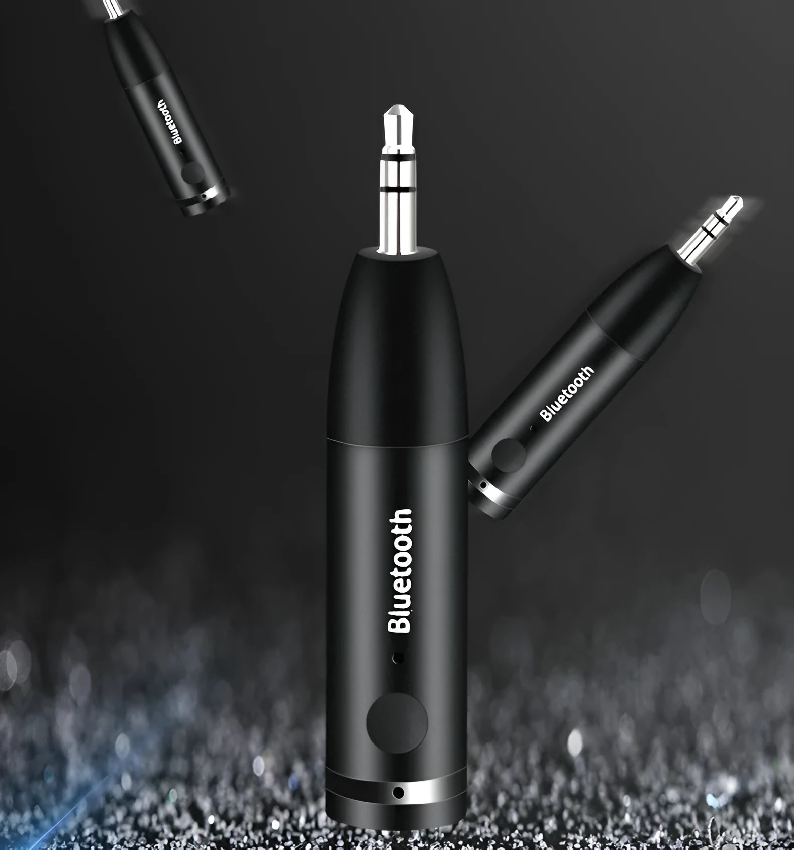 Black AUX Bluetooth 5.0 audio receiver for car or home stereo with USB cable.