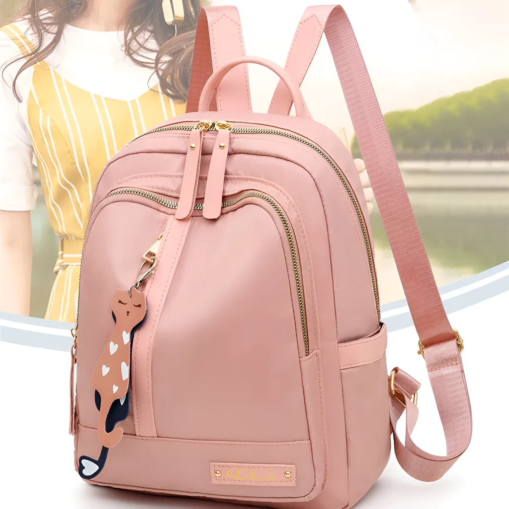 Black casual nylon backpack with shoulder straps, showing internal organiSation pockets and a soft handle.