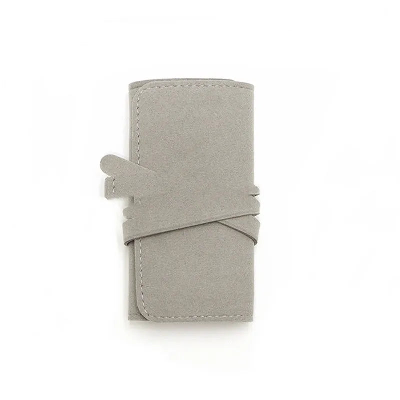 Brown soft leather square jewellery storage pouch measuring 12cm by 12cm