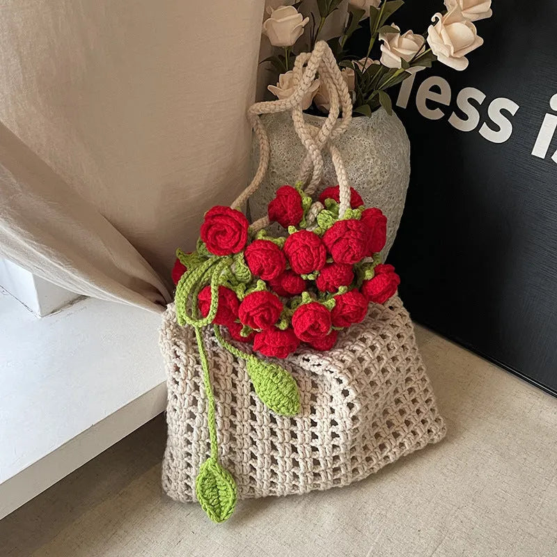 Artistic girls' one-shoulder bag with woven rose bouquet design in pink and red, soft material, double straps