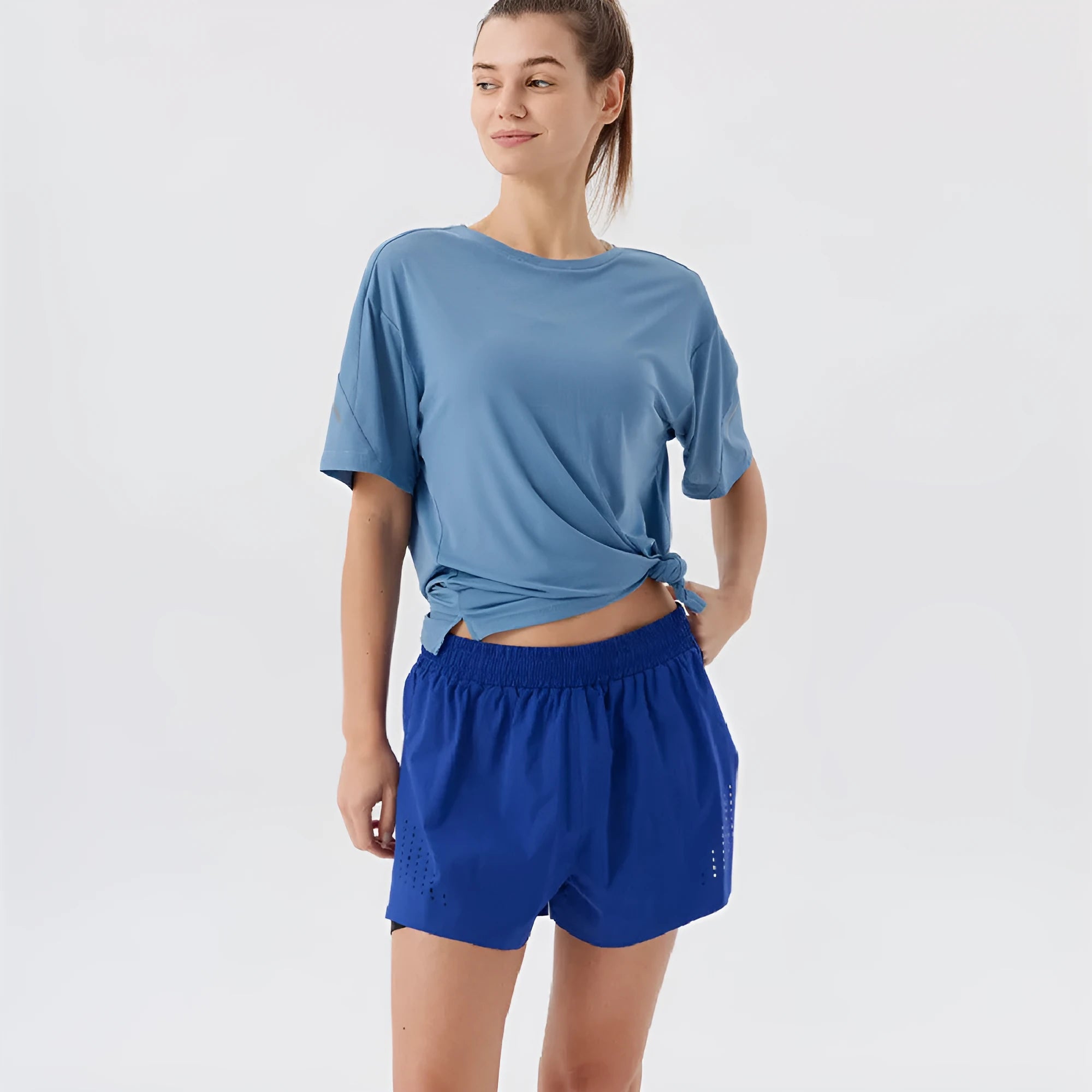 Men's micro-elastic nylon sports shorts with side slits in turmeric, night blue, or black colours