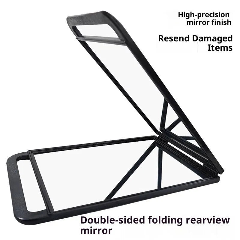 Double large folding hairdressing rearview mirror in black with HD double-sided reflective surface on a table