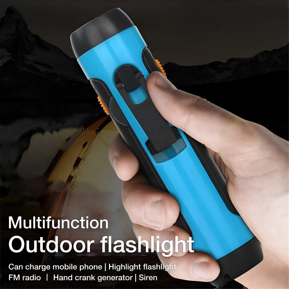 Orange emergency FM rechargeable alarm flashlight with hand crank on a dark outdoor background