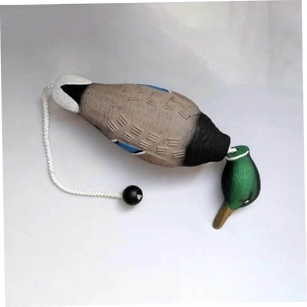 Green no-stuffing duck dog toy made from EVA, 35 cm x 10.5 cm x 8 cm, with quacking sound for chewing and training.