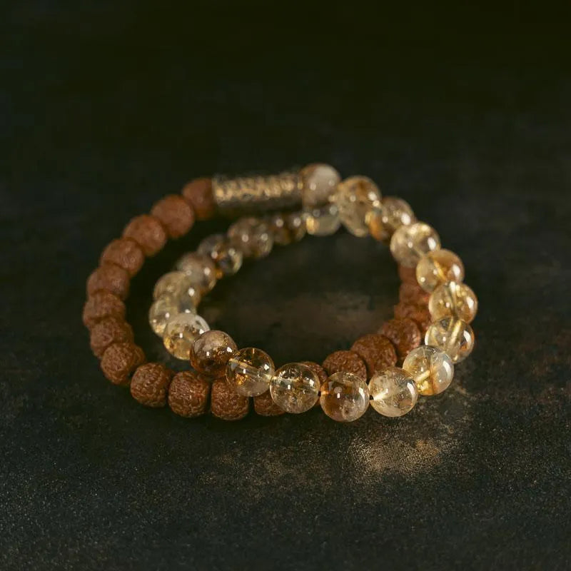 Personalised natural colour LCD double circle bracelet showing custom message on citrine display
