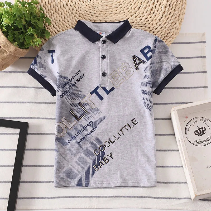 A solid colour short sleeve polo shirt for a young boy, made from soft cotton fabric.