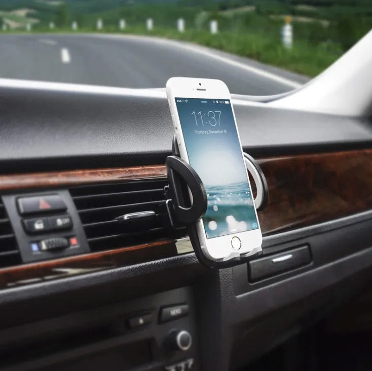 Black universal car mobile phone holder mounted on air conditioning vent