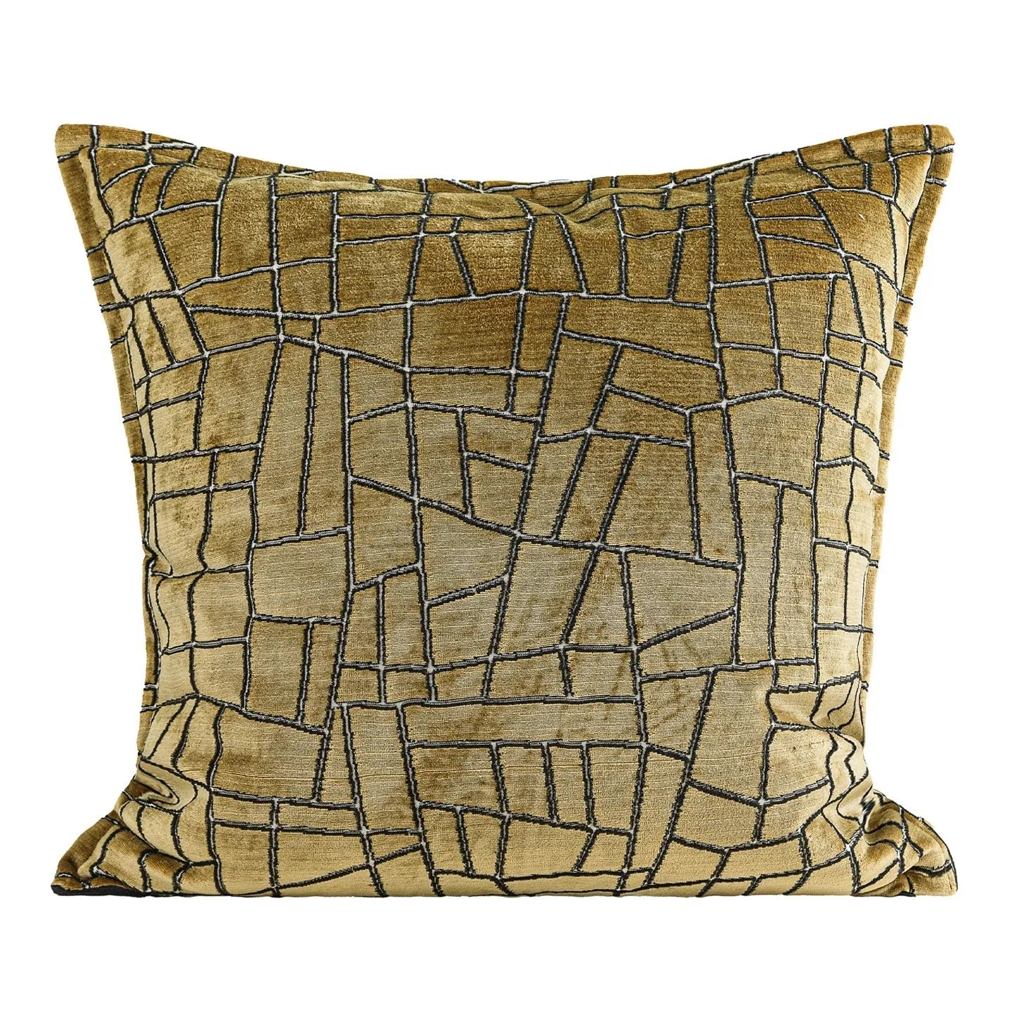 Geometric patterned cushion covers in gold colour on a grey sofa.