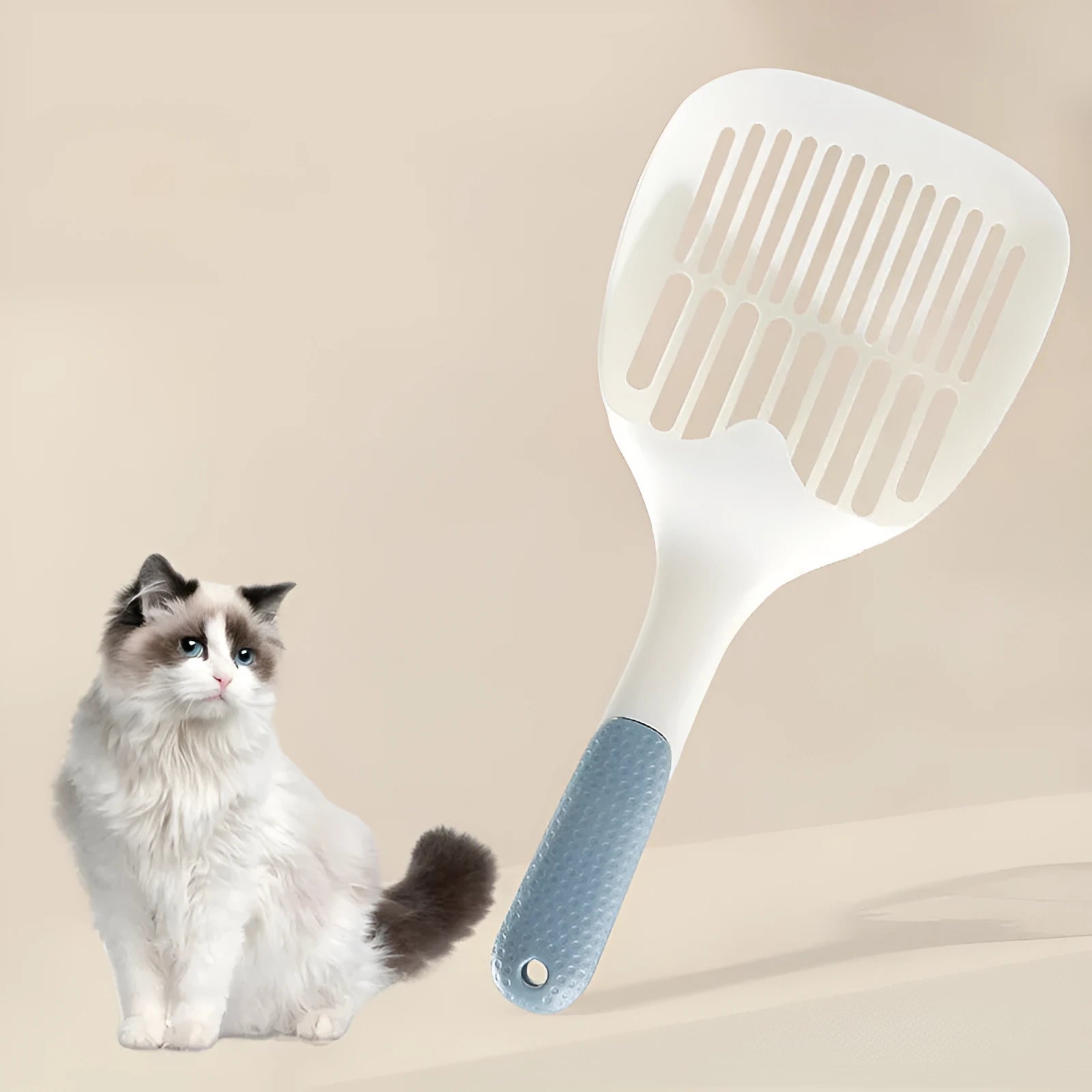 Large white plastic cat litter scoop with a deep bowl and multiple drainage holes.