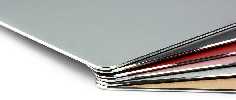 Aluminium alloy double-sided mouse pad with wrist support, USB hub, and hand warmer, in black, gold, or silver.