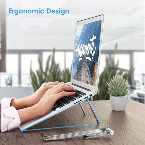 Black aluminium notebook stand supporting a silver laptop on a desk.