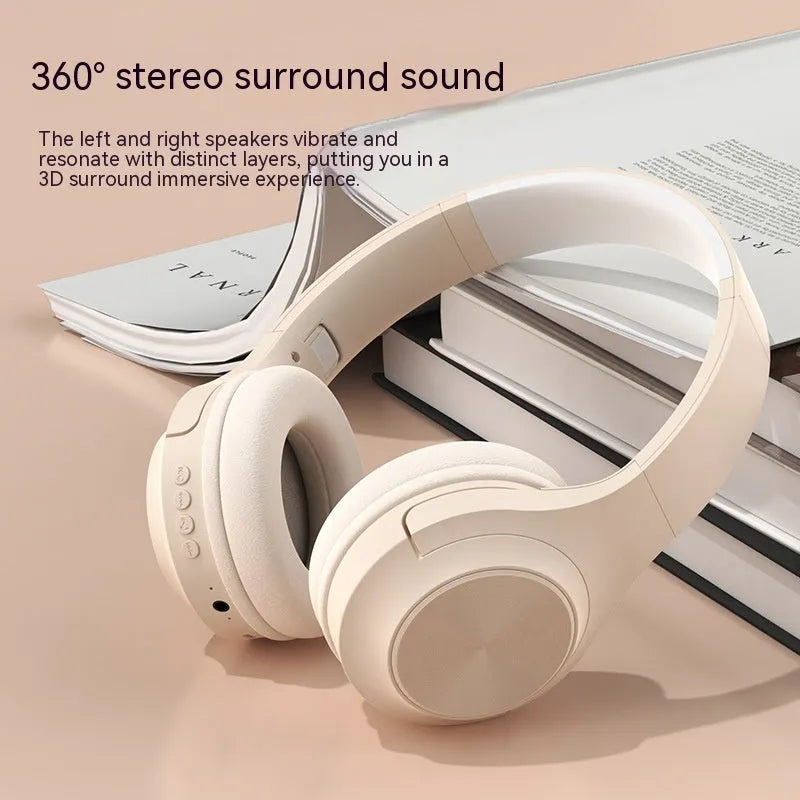 A creative head-mounted wireless Bluetooth headset in youth green colour with its matching charging case.
