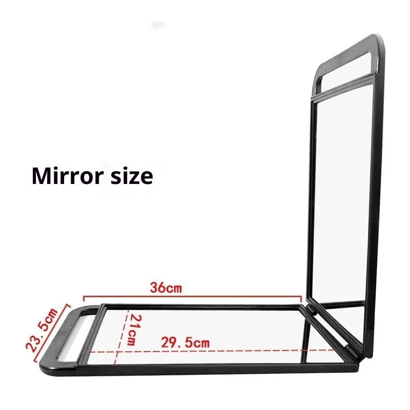 Double large folding hairdressing rearview mirror in black with HD double-sided reflective surface on a table