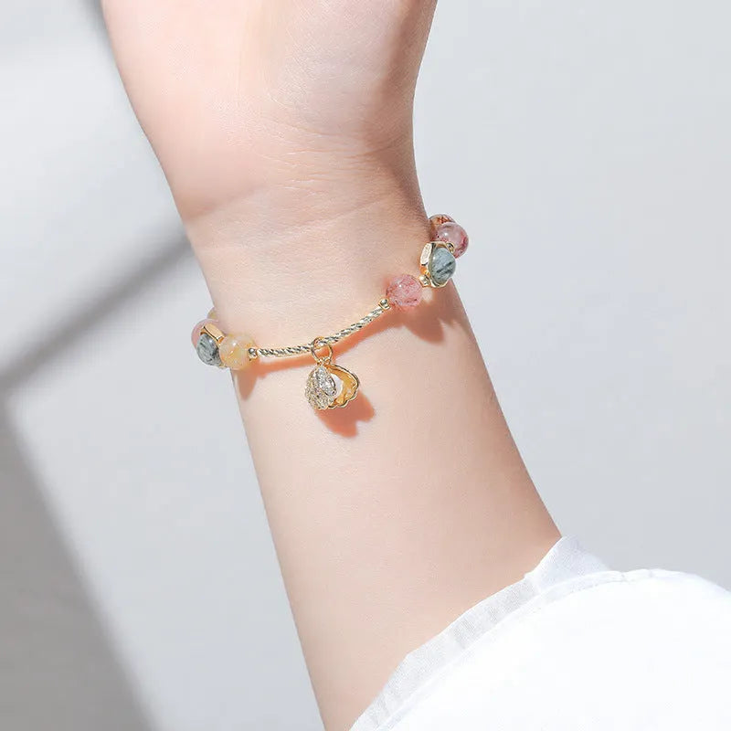 Women's crystal bracelet with coloured hair crystal shells and animal zodiac designs