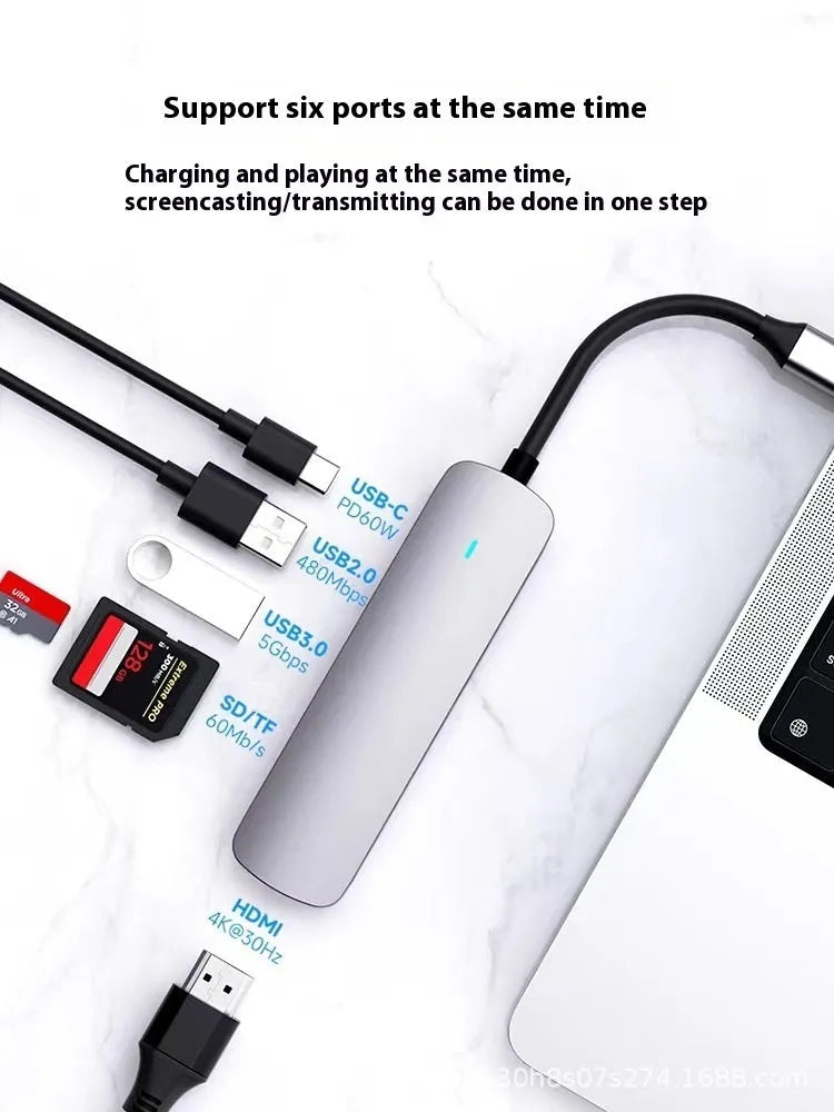 A USB-C 7-in-1 multi-function expansion dock hub with an attached 15cm cable.