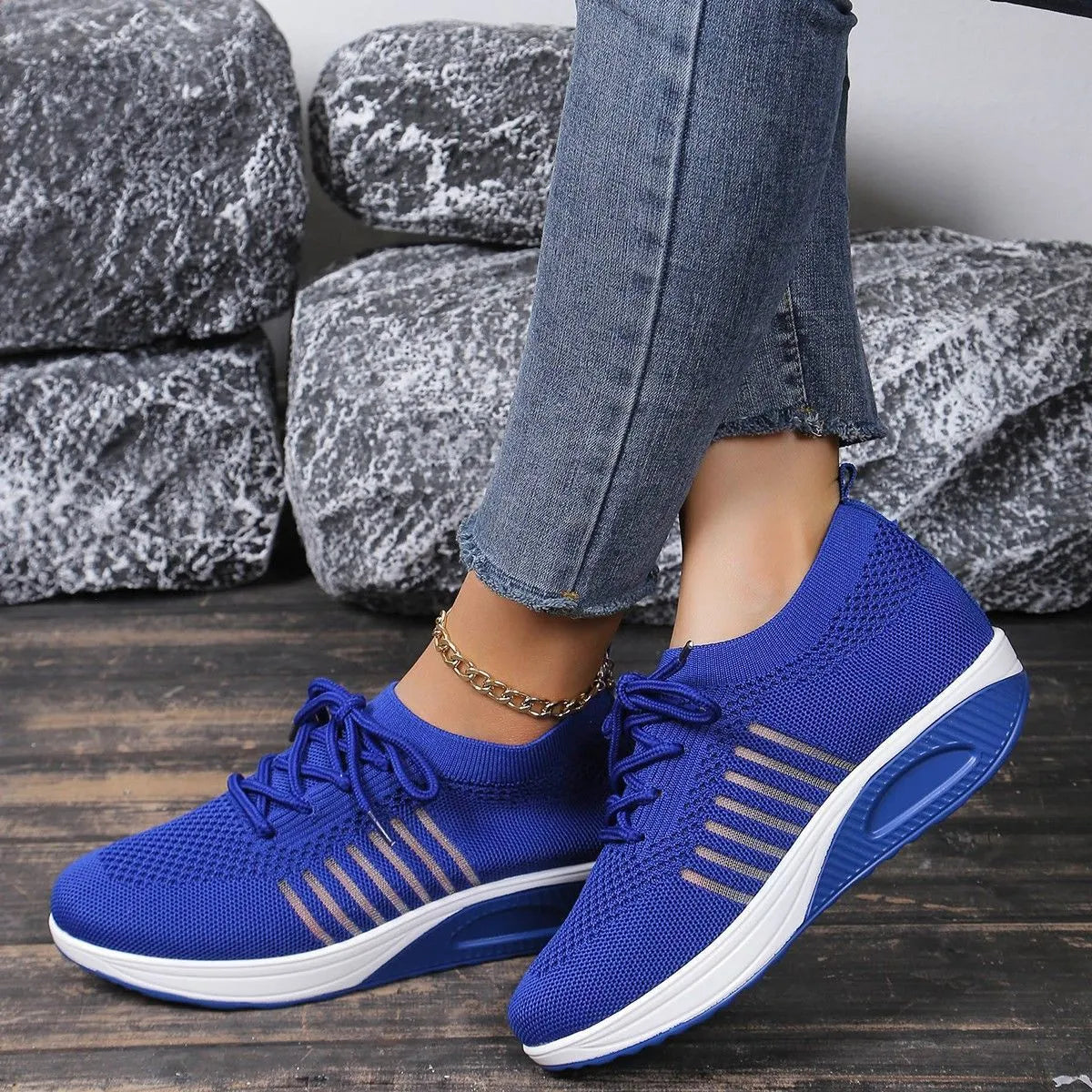 Women's lace-up flat shoes with mesh upper and platform heel in black, dark blue, or red colour options