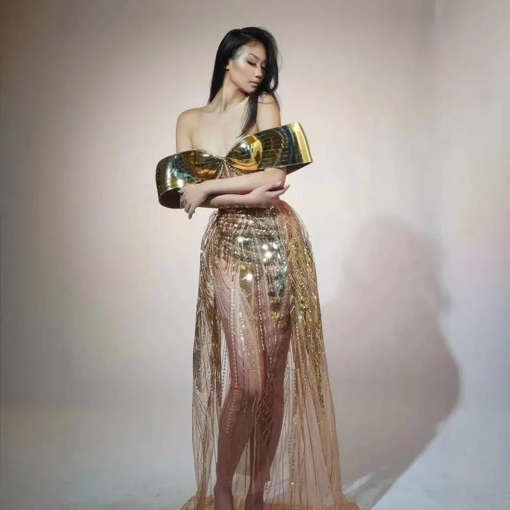 Gold strapless sequin dress with thigh-high split and tulle skirt, floor-length formal gown