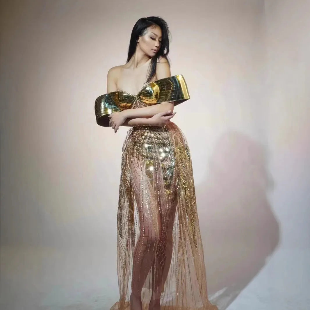 Gold strapless sequin dress with thigh-high split and tulle skirt, floor-length formal gown