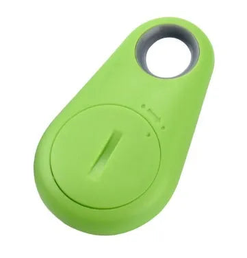 Small Bluetooth tracker in black with keyring hole, 3.1cm x 5.2cm, paired with smartphone