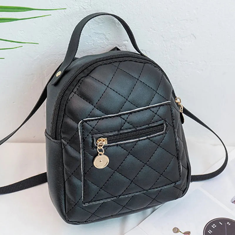 Girls' hard square PU backpack with embroidery in black, white, or pink, showing front and handle.