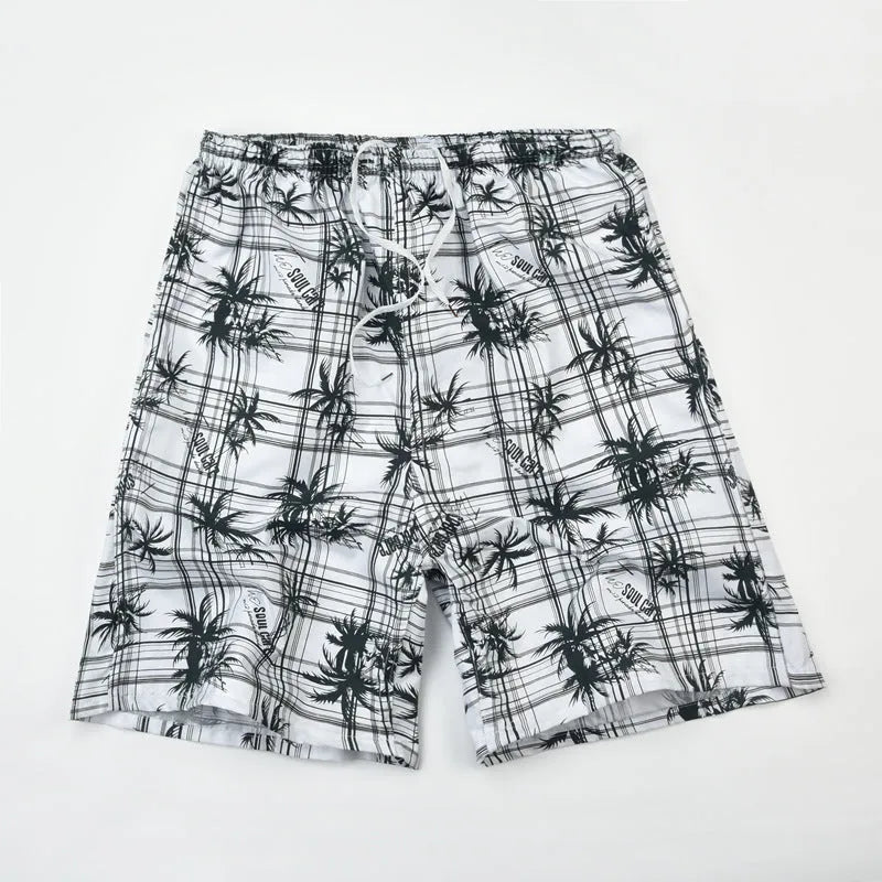 Men's floral print swimming trunks showing five-point design and polyester fabric