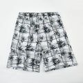 Men's floral print swimming trunks showing five-point design and polyester fabric