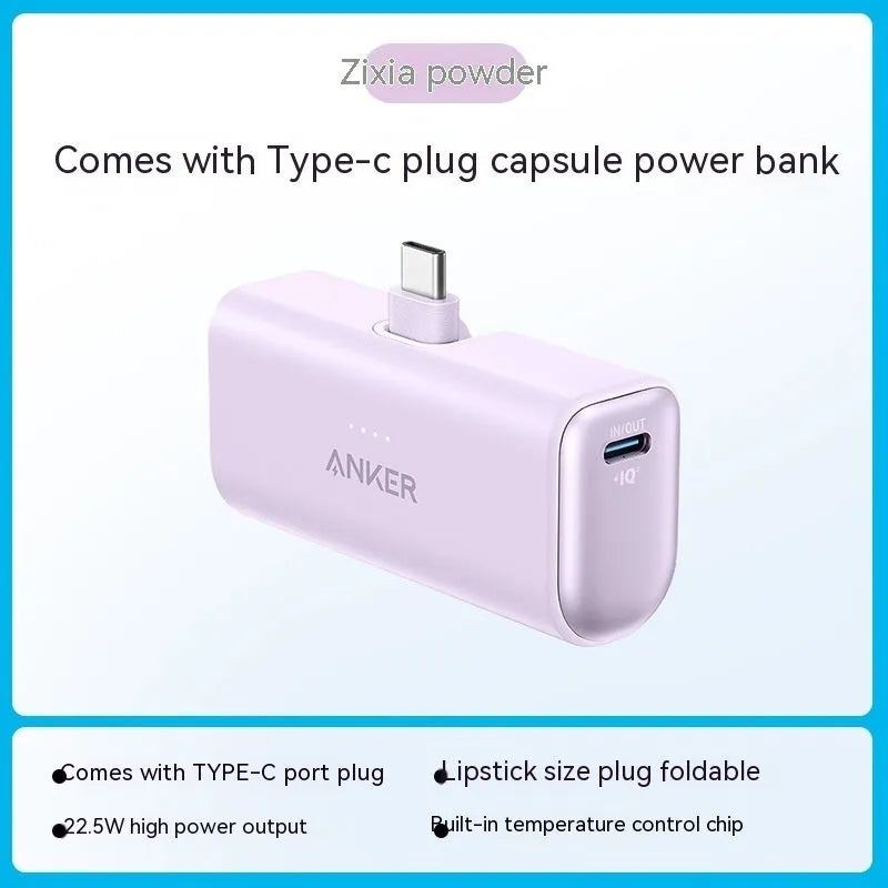Small capsule-shaped power bank in multiple colours showing USB-C port and compact size.