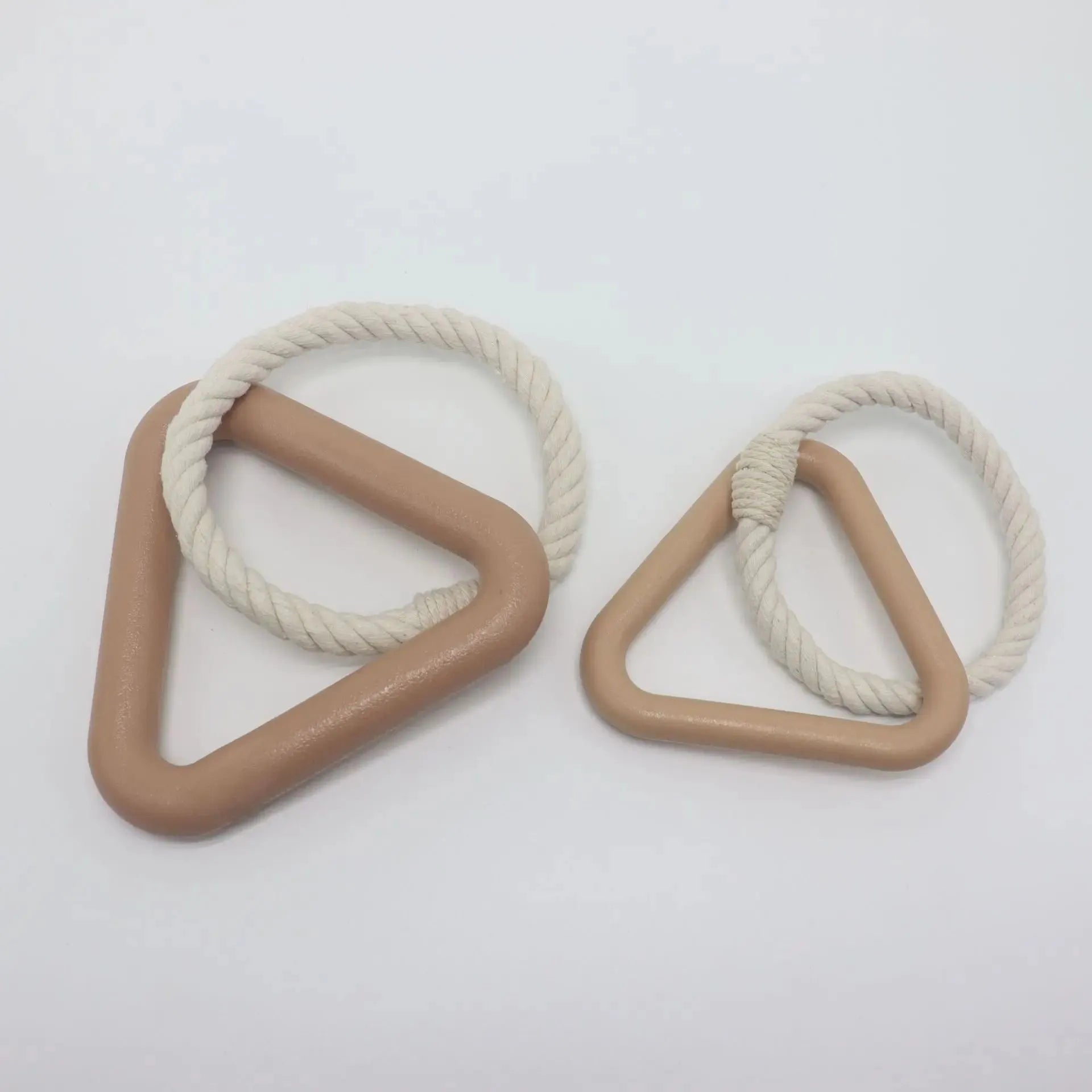 Triangular cotton rope dog pull toy in beige colour on wooden floor