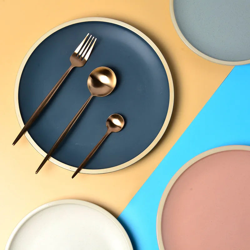 Blue matte ceramic plate with 10 inch diameter on table setting
