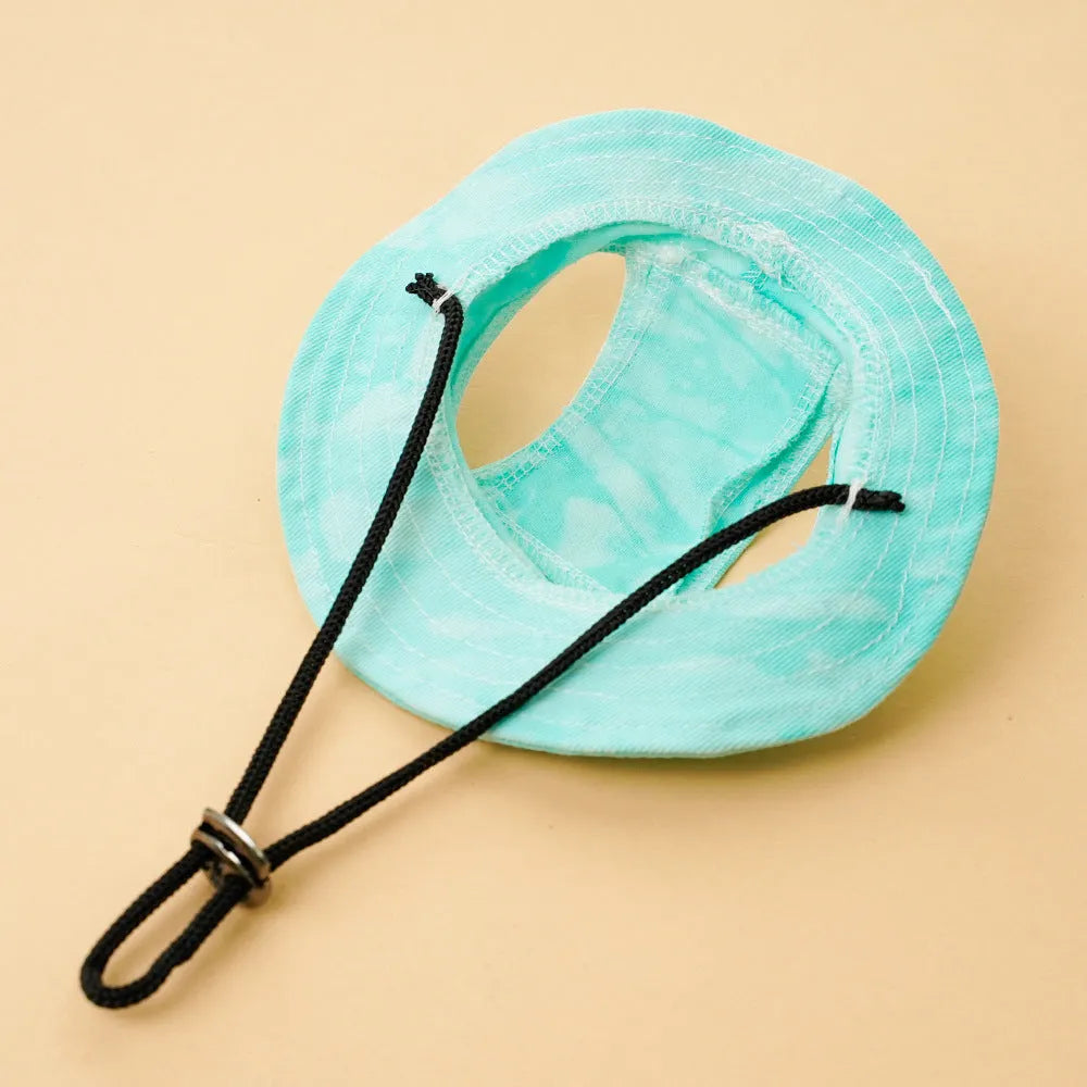 Pet sun hat for dog and cat with adjustable chin strap, polyester bucket style, available in multiple tie-dye colours