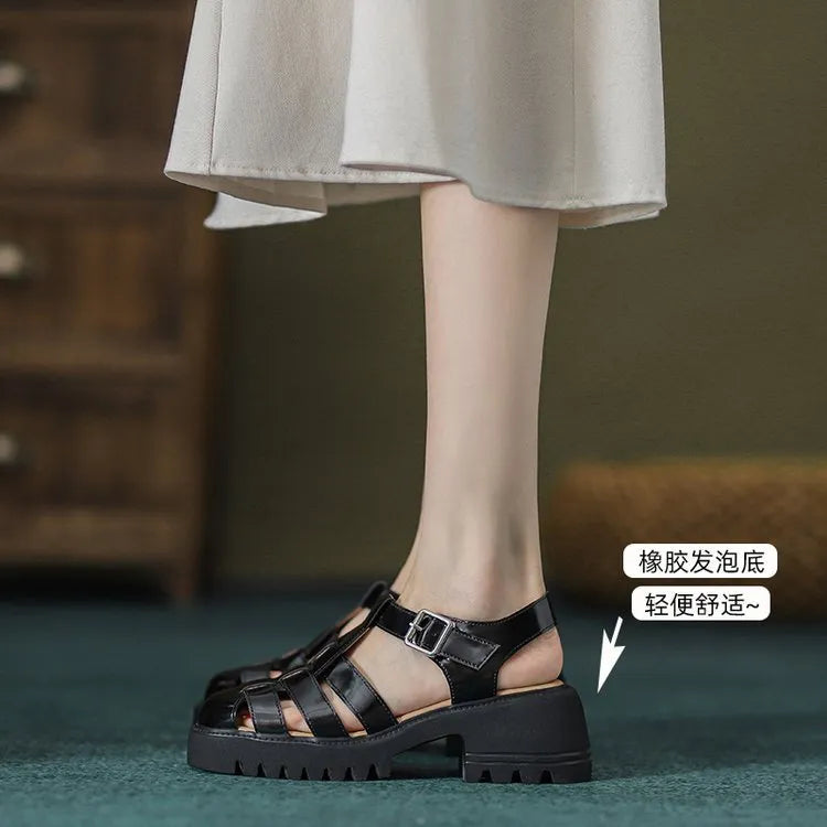 Women's retro closed-toe platform sandals with chunky heel and buckle strap in beige.