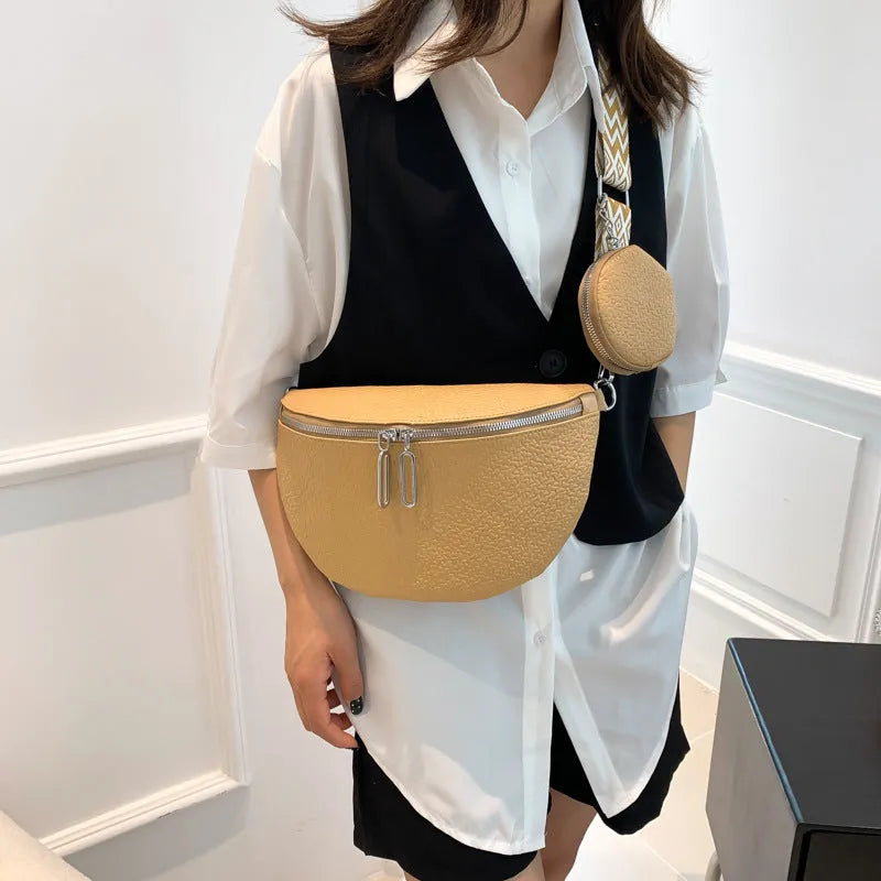 Solid colour women's crossbody bag with textured PU leather and clamshell design