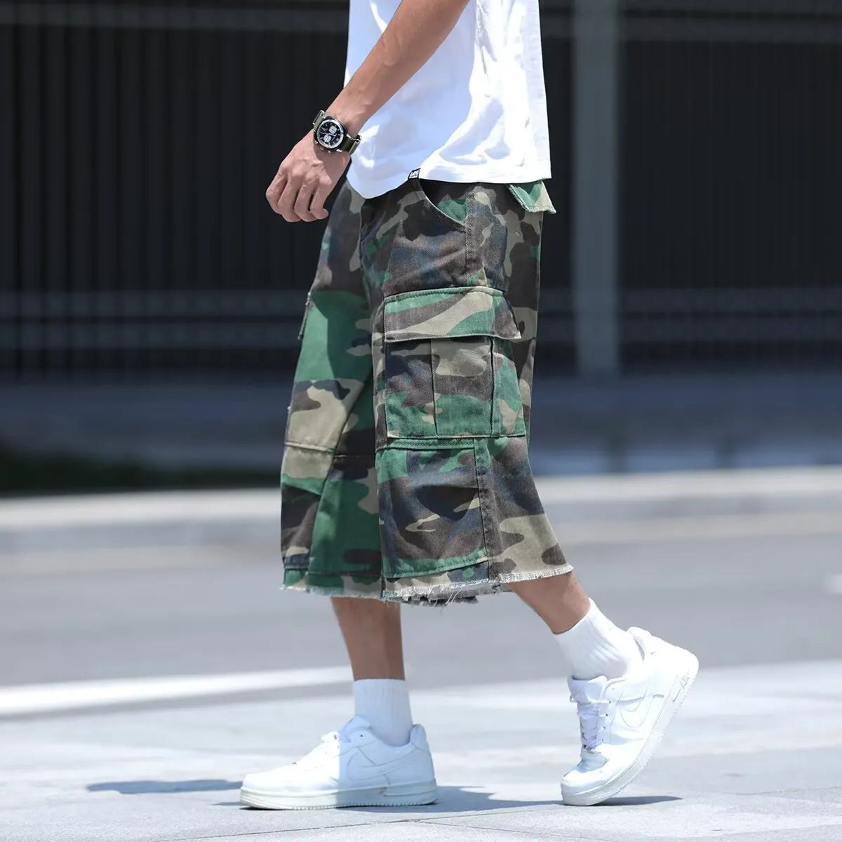 American retro workwear style camouflage shorts in loose-fit cropped design for summer wear