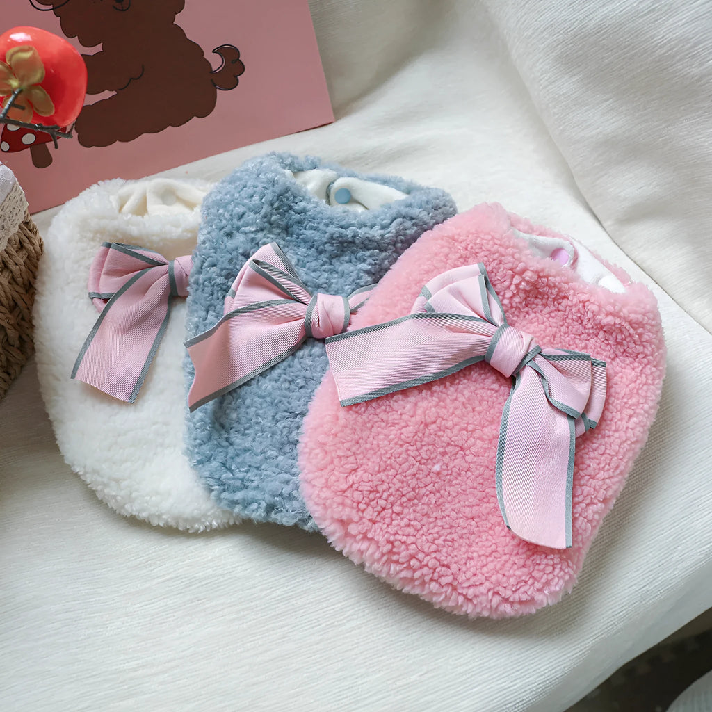 Bowknot polyester pet vest in blue, pink, or white, sizes XS to XL, chest 30-54cm