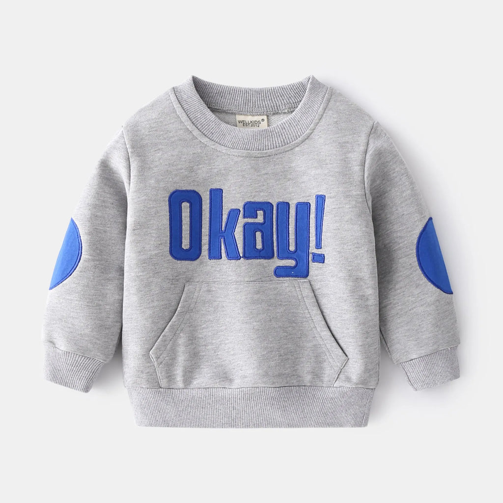 Casual boys cotton pullover sweatshirt with English print in navy blue on child model
