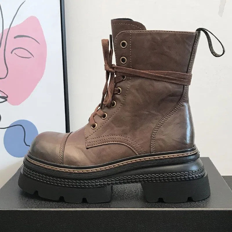 Women's black or brown ankle boots with 3-5 cm chunky mid heel, side zipper, waterproof platform, round toe, and rubber sole.