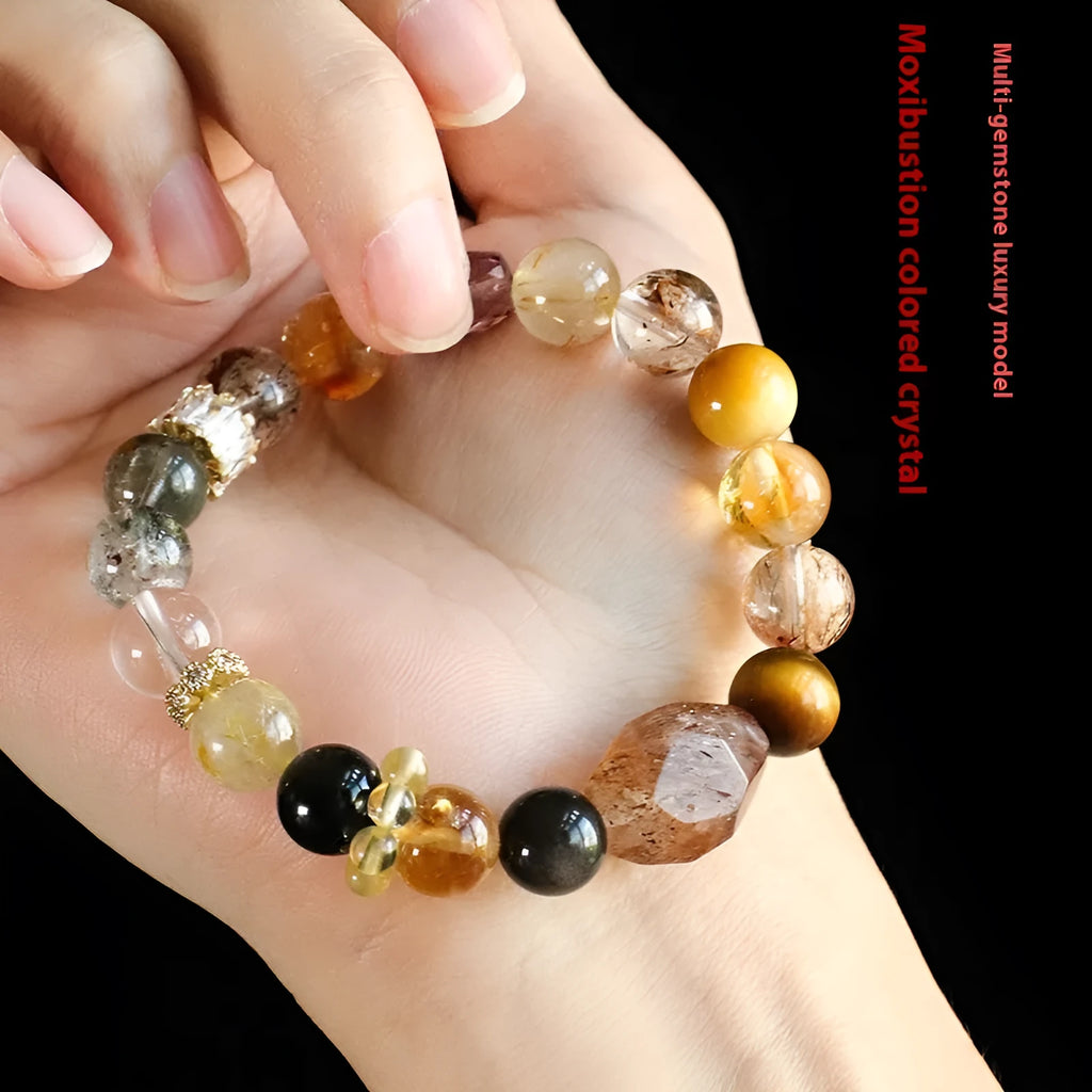 Close-up of a handmade black and gold natural crystal bead bracelet for women.