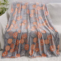 Cartoon-patterned flannel blanket draped over a child's air conditioning unit.