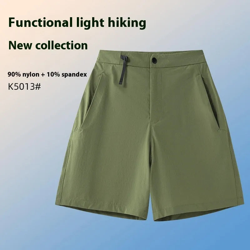 Man wearing khaki 3D cut quick-dry sports shorts with four-way stretch, suitable for running.