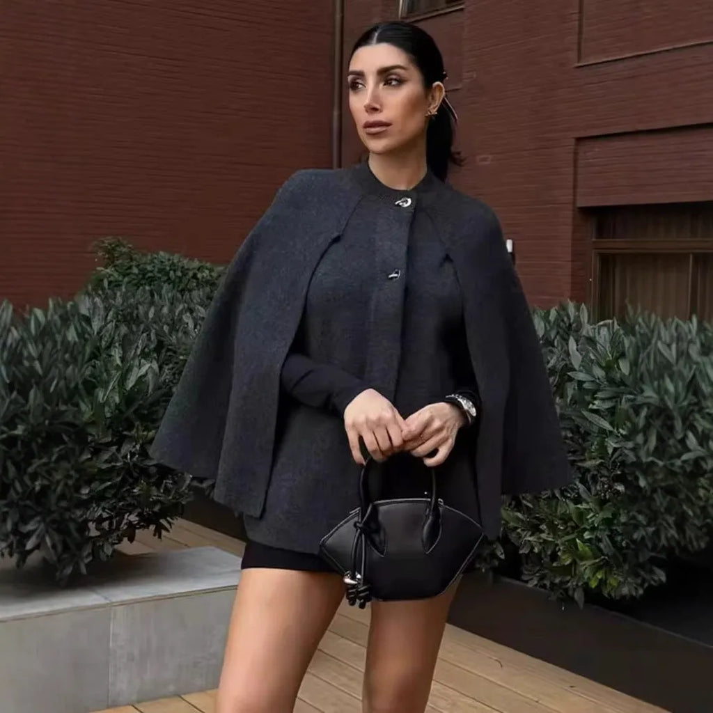 Cape round neck long sleeve knitted sweater coat in solid colour polyester, available in gray and wine red, sizes S M L