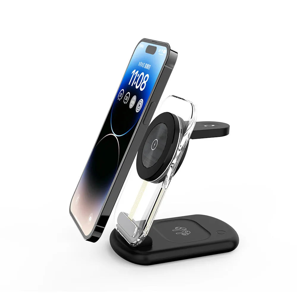 Clear folding wireless charger showing three internal coils, propped upright charging a mobile phone.